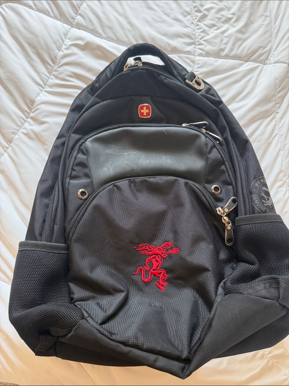 Black Swiss-Style Backpack with Fireball Logo